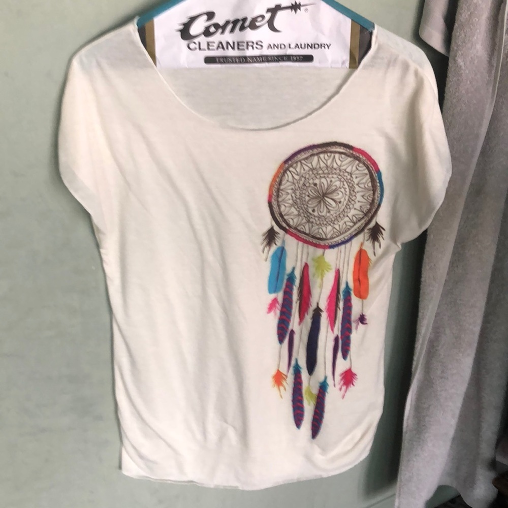 Cute t-shirt was worn once but to short for me